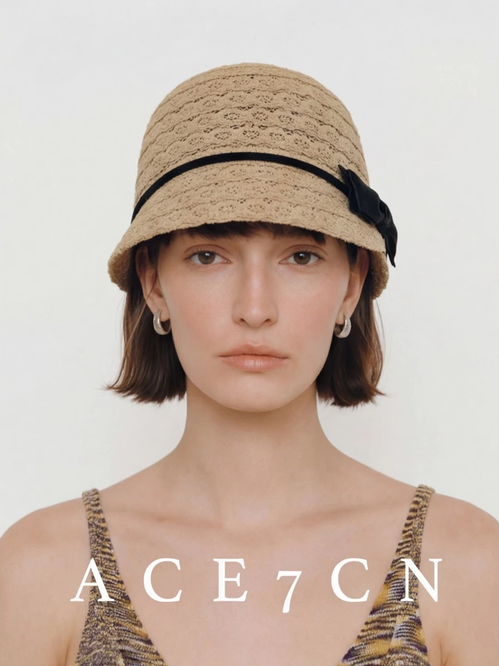 Embroidered Bow Openwork Equestrian Cap — ACE7CN