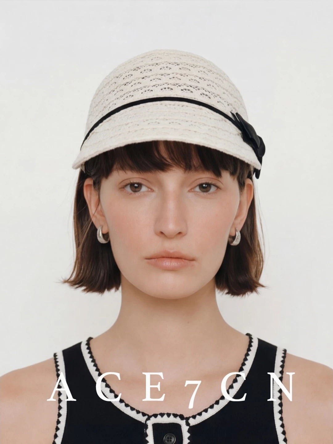 Embroidered Bow Openwork Equestrian Cap — ACE7CN