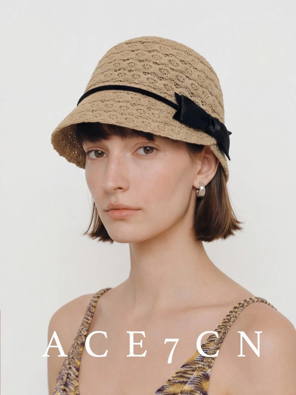 Embroidered Bow Openwork Equestrian Cap — ACE7CN