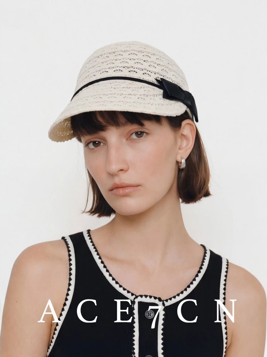 Embroidered Bow Openwork Equestrian Cap — ACE7CN